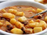 Meat and potatoes in a slow cooker